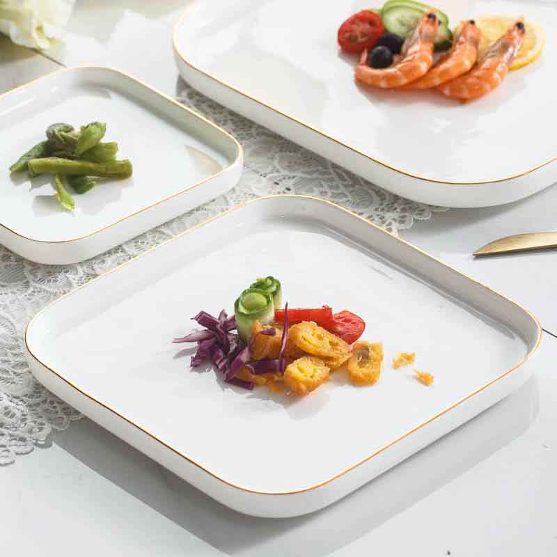 北歐簡約風格陶瓷盤精緻金邊設計彰顯優雅品味適閤家庭餐桌和餐廳使用